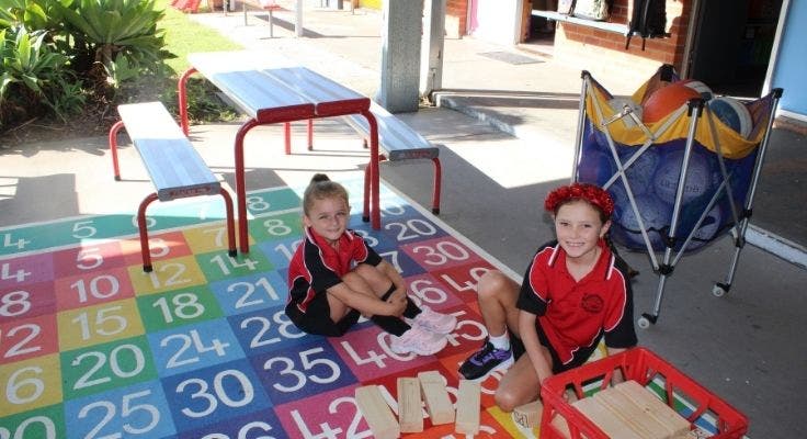 two_girls_outside_playing