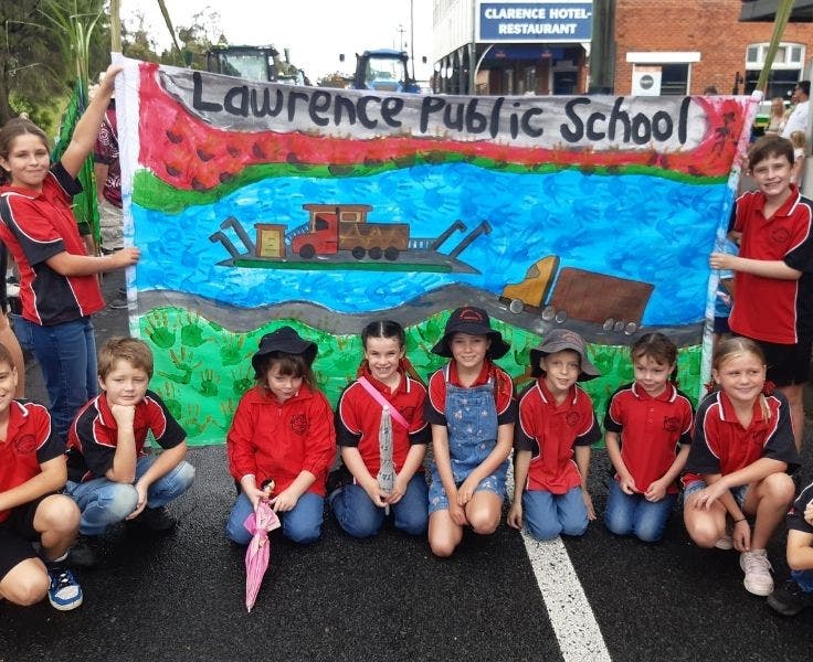 students_holding_a_banner