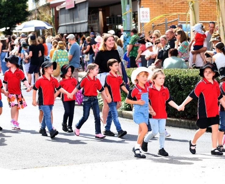 students_walking_in_a_parade